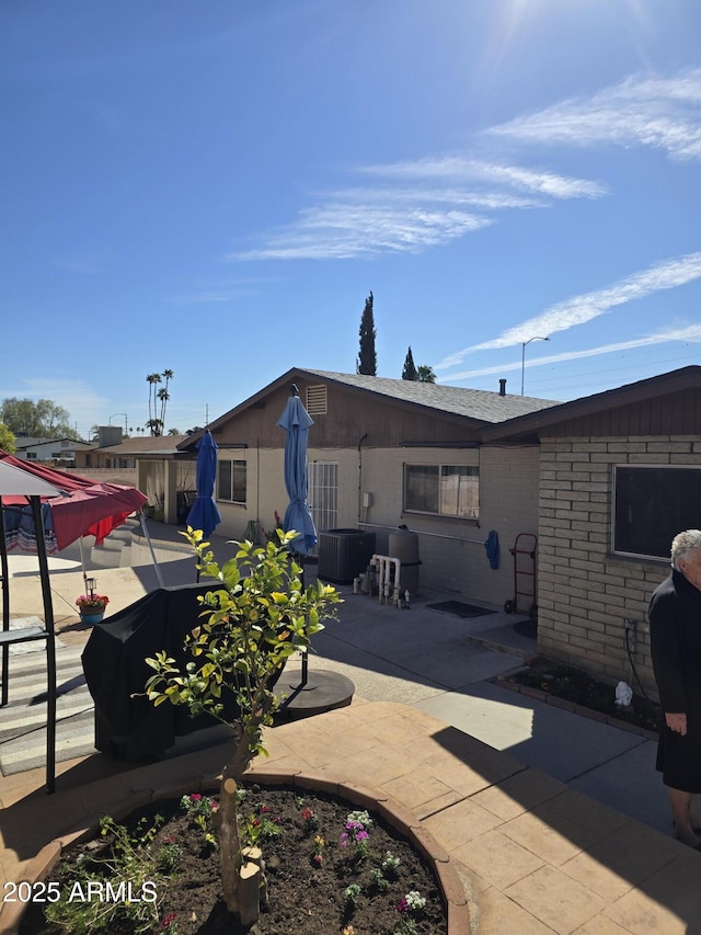 view of patio / terrace with central AC