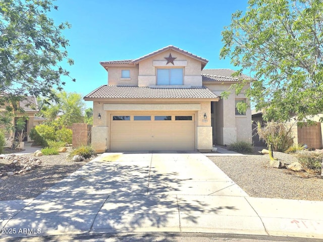 44583 W Sandstone Dr, Maricopa, AZ 85139 - mediterranean / spanish-style home with a tile roof, stucco siding, concrete driveway, and a garage