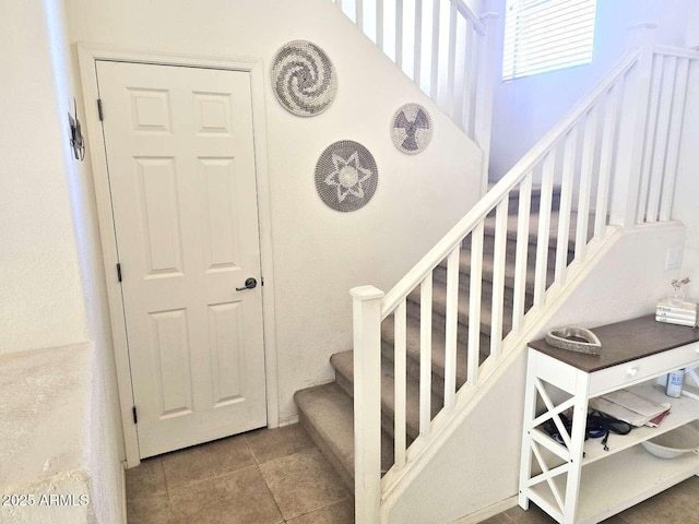44583 W Sandstone Dr, Maricopa, AZ 85139 - stairs featuring tile patterned flooring