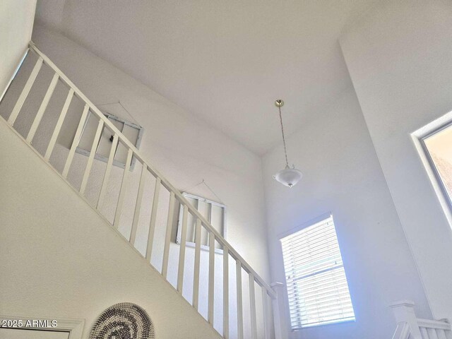 44583 W Sandstone Dr, Maricopa, AZ 85139 - stairway with a towering ceiling