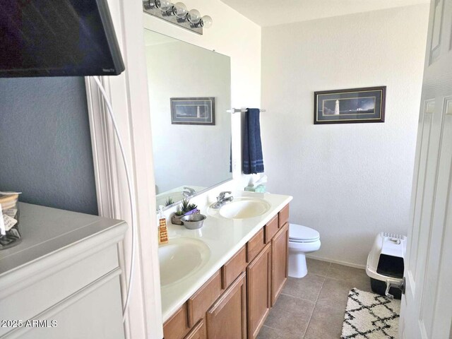 44583 W Sandstone Dr, Maricopa, AZ 85139 - bathroom with double vanity and tile patterned floors