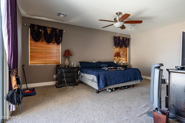 bedroom featuring ceiling fan and carpet floors