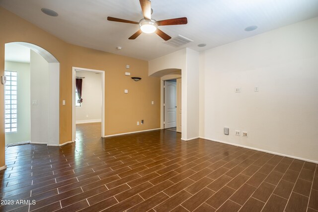 unfurnished room featuring ceiling fan