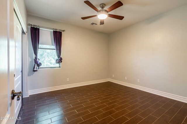 empty room featuring ceiling fan