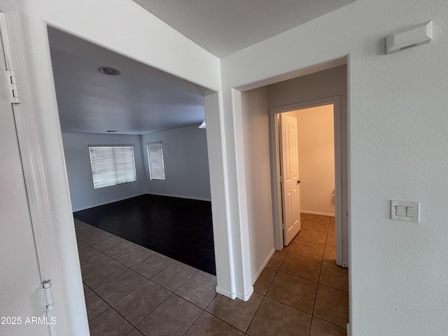 18629 W Fulton St, Goodyear, AZ 85338 - hall with tile patterned flooring and baseboards