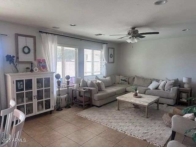 18629 W Fulton St, Goodyear, AZ 85338 - living room with light tile patterned floors, a ceiling fan, and recessed lighting