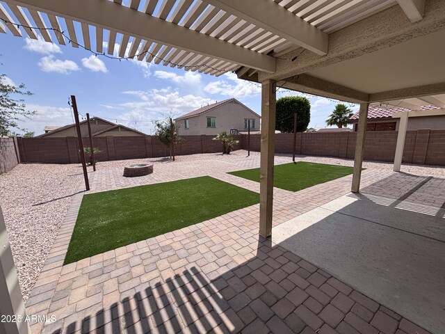 18629 W Fulton St, Goodyear, AZ 85338 - view of patio with a pergola and an outdoor fire pit