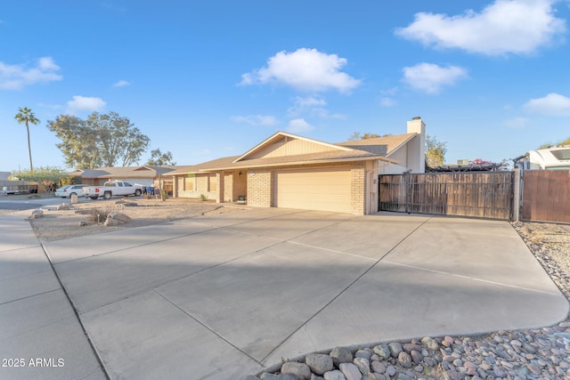 ranch-style home featuring a garage