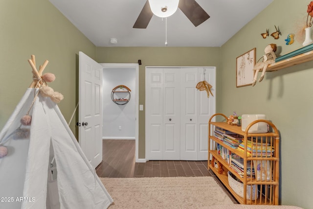 bedroom with a closet and ceiling fan