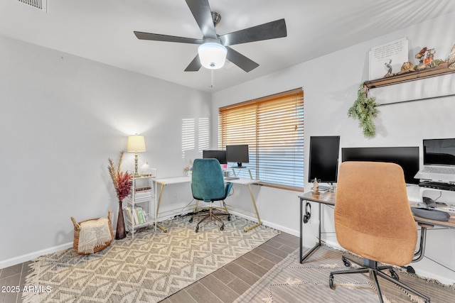 office space featuring ceiling fan