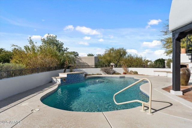 view of pool with a patio, a fenced backyard, and a fenced in pool