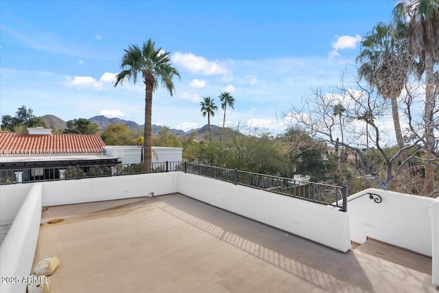 view of patio / terrace with a mountain view