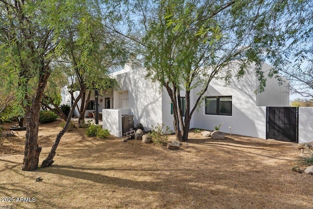 view of home's exterior featuring stucco siding