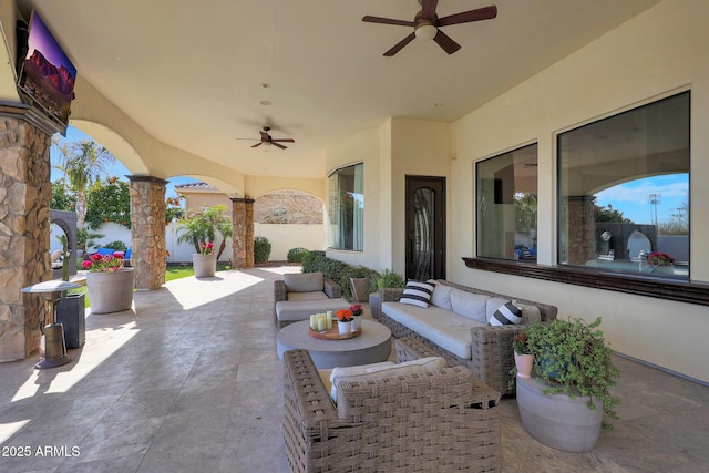 view of patio / terrace featuring an outdoor hangout area and ceiling fan