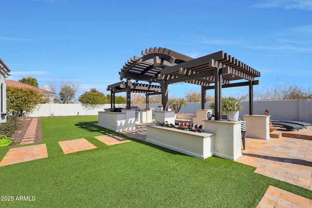 view of yard featuring a patio, exterior bar, and a pergola