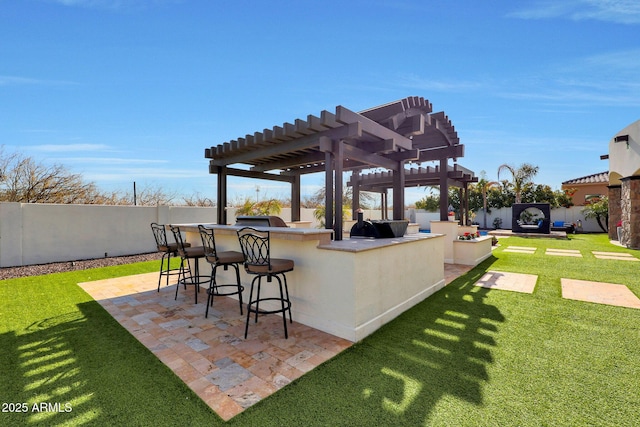 view of patio / terrace with a pergola and exterior bar