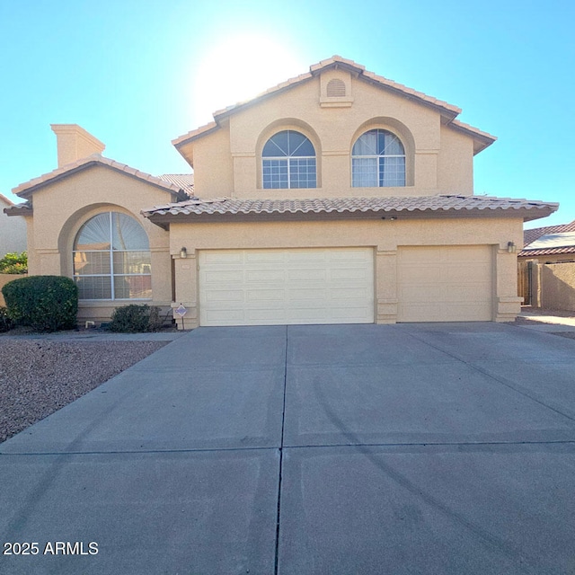 view of front of house with a garage