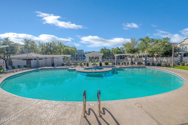 view of swimming pool featuring a patio