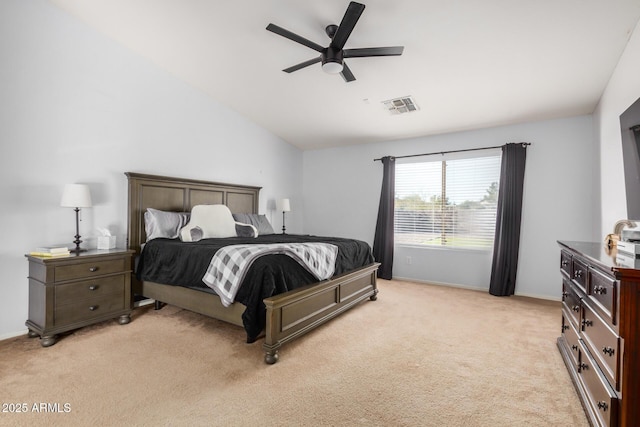 bedroom featuring light carpet, visible vents, baseboards, and vaulted ceiling