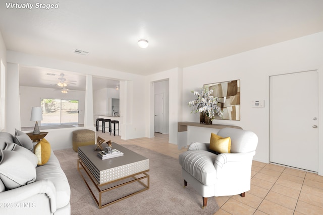 1501 S 122nd Ave, Avondale, AZ 85323 - living area featuring light tile patterned floors and ceiling fan
