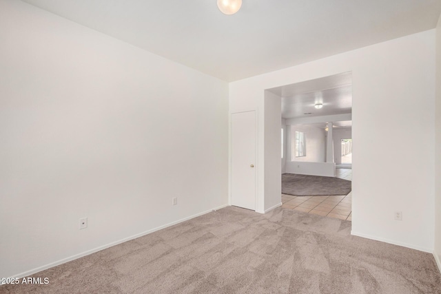 1501 S 122nd Ave, Avondale, AZ 85323 - carpeted spare room with baseboards and tile patterned floors