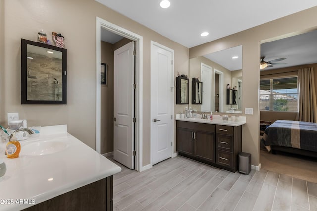 bathroom featuring vanity and ceiling fan