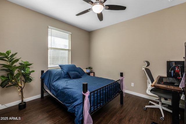 bedroom featuring ceiling fan and dark hardwood / wood-style flooring