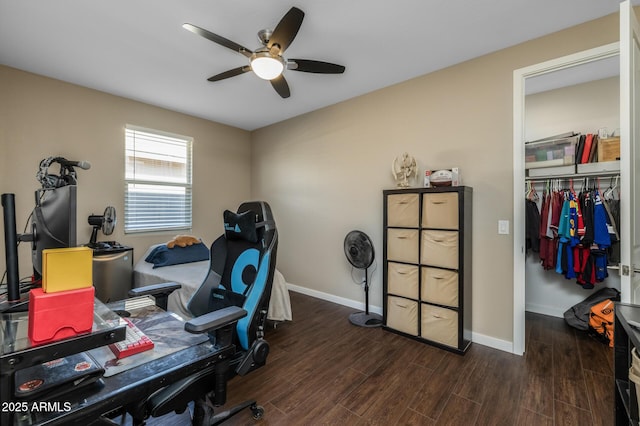 office area featuring ceiling fan and dark hardwood / wood-style flooring