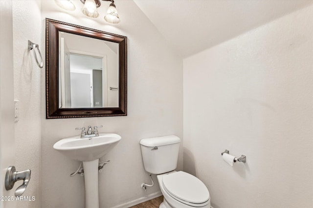 4380 E Renee Dr, Phoenix, AZ 85050 - half bath with toilet, lofted ceiling, and baseboards