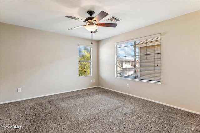 4380 E Renee Dr, Phoenix, AZ 85050 - carpeted spare room featuring a ceiling fan and baseboards