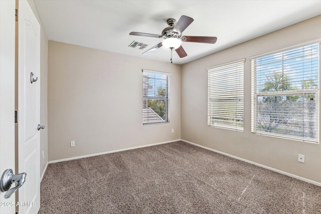 4380 E Renee Dr, Phoenix, AZ 85050 - spare room with carpet, ceiling fan, and baseboards