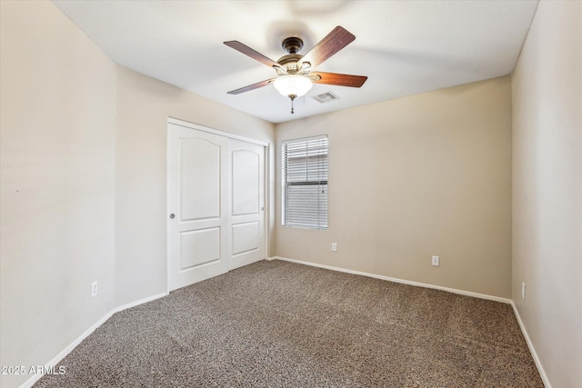 4380 E Renee Dr, Phoenix, AZ 85050 - unfurnished bedroom featuring carpet floors, baseboards, and a closet