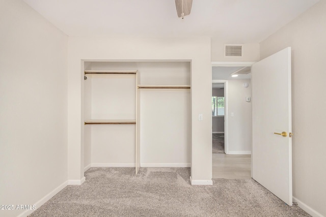 1906 N Evergreen St, Chandler, AZ 85225 - unfurnished bedroom featuring carpet floors, a closet, baseboards, and ceiling fan
