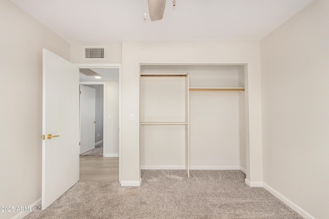 1906 N Evergreen St, Chandler, AZ 85225 - unfurnished bedroom featuring carpet, a closet, baseboards, and ceiling fan
