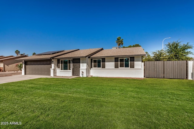 1906 N Evergreen St, Chandler, AZ 85225 - single story home featuring driveway, roof mounted solar panels, a garage, brick siding, and roof with shingles