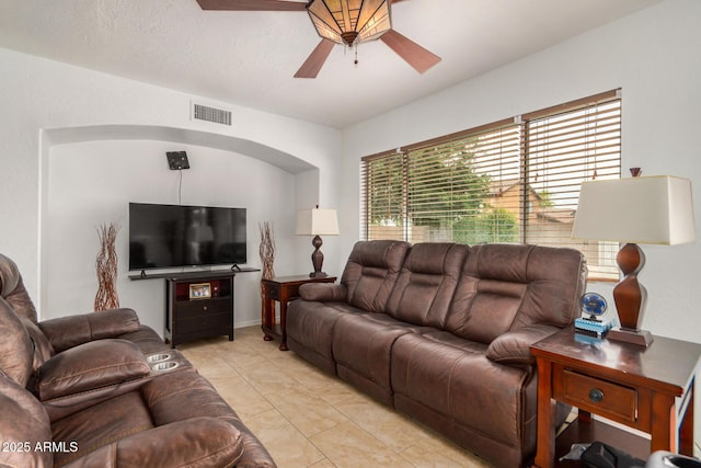 5220 W Desert Ln, Laveen, AZ 85339 - living area with ceiling fan and arched walkways