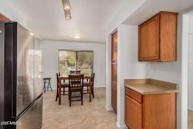 5220 W Desert Ln, Laveen, AZ 85339 - dining space with baseboards