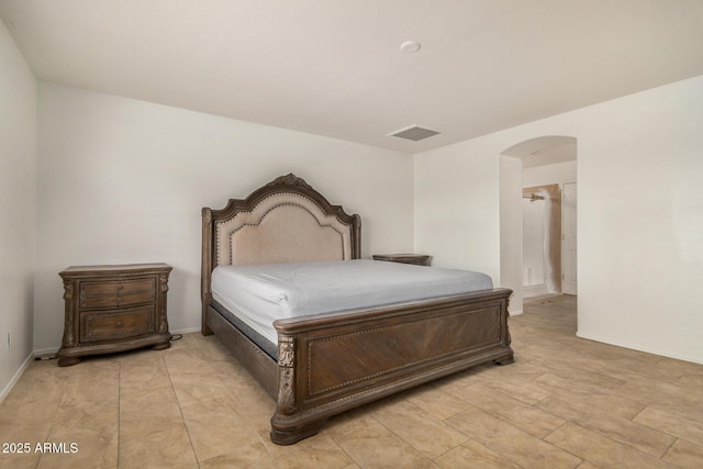 5220 W Desert Ln, Laveen, AZ 85339 - bedroom featuring arched walkways