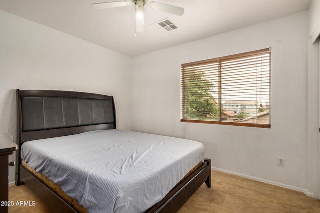 5220 W Desert Ln, Laveen, AZ 85339 - bedroom featuring baseboards and ceiling fan