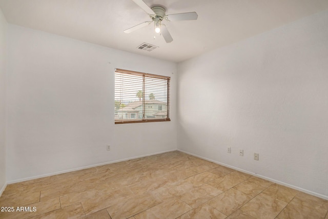5220 W Desert Ln, Laveen, AZ 85339 - unfurnished room with a ceiling fan and baseboards