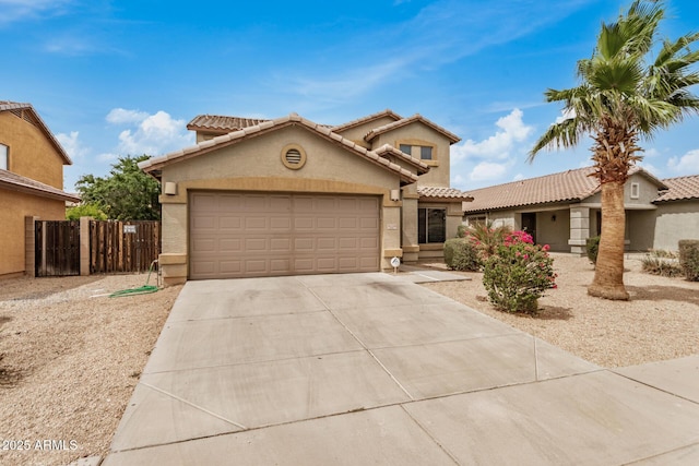 5220 W Desert Ln, Laveen, AZ 85339 - view of front of property featuring stucco siding, a garage, concrete driveway, and a tiled roof