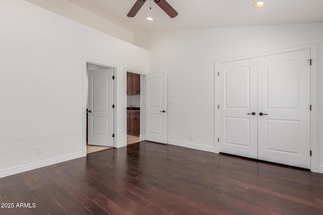 unfurnished bedroom featuring baseboards, recessed lighting, and wood finished floors