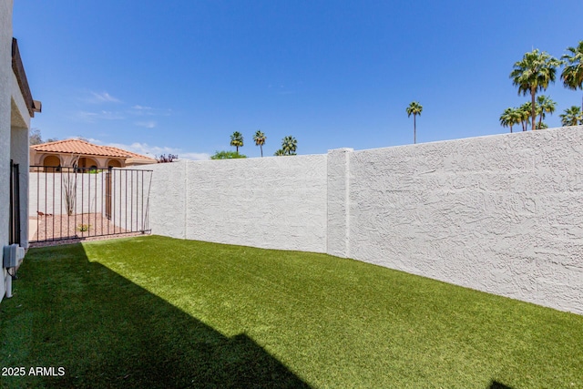 view of yard featuring fence