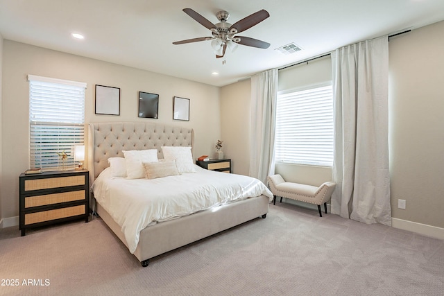 carpeted bedroom featuring ceiling fan