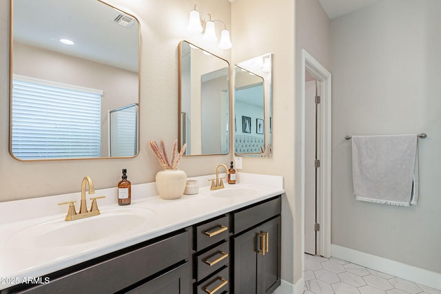 bathroom featuring vanity and tile patterned floors