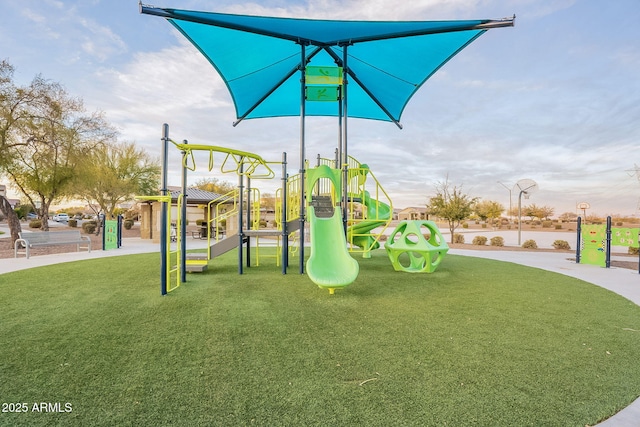 view of jungle gym with a lawn