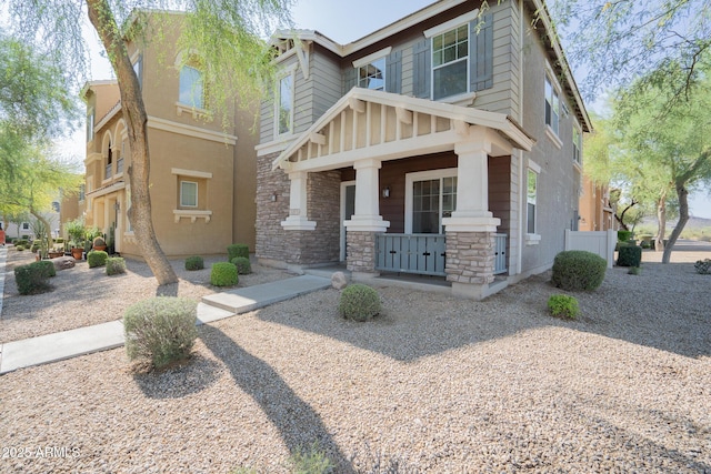 34979 N 30th Ave, Phoenix, AZ 85086 - craftsman inspired home featuring stone siding and a porch