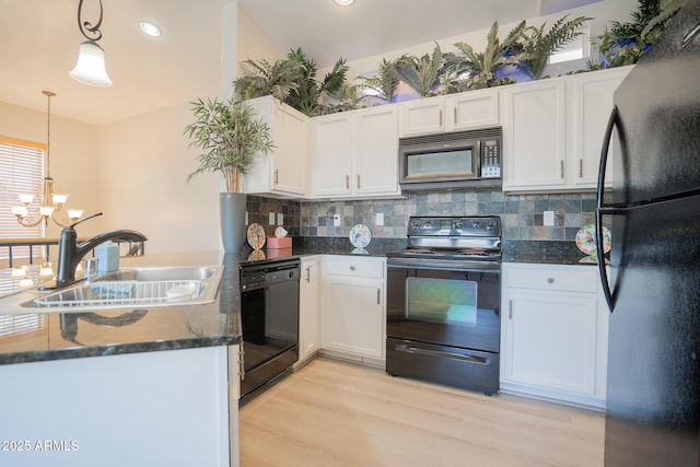 34979 N 30th Ave, Phoenix, AZ 85086 - kitchen featuring black appliances, a sink, white cabinetry, tasteful backsplash, and a chandelier