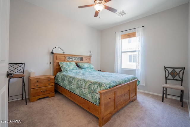 34979 N 30th Ave, Phoenix, AZ 85086 - bedroom featuring light carpet, baseboards, and a ceiling fan