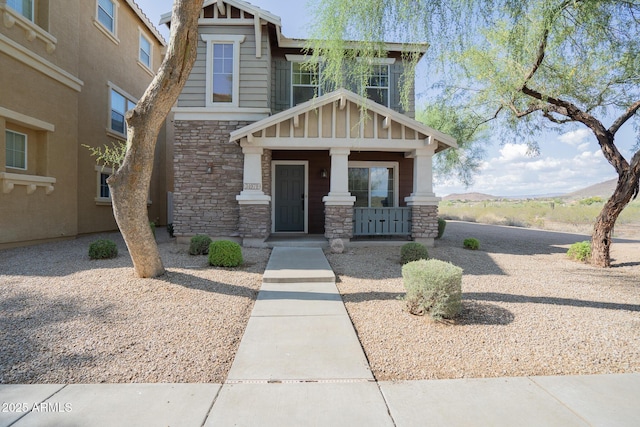 34979 N 30th Ave, Phoenix, AZ 85086 - craftsman-style home with stone siding and a porch